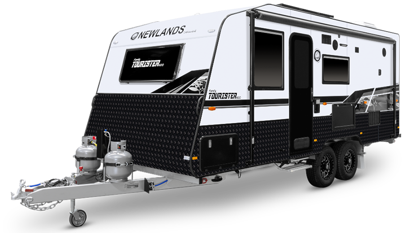 Newlands Tourister Caravan is being parked in the yard